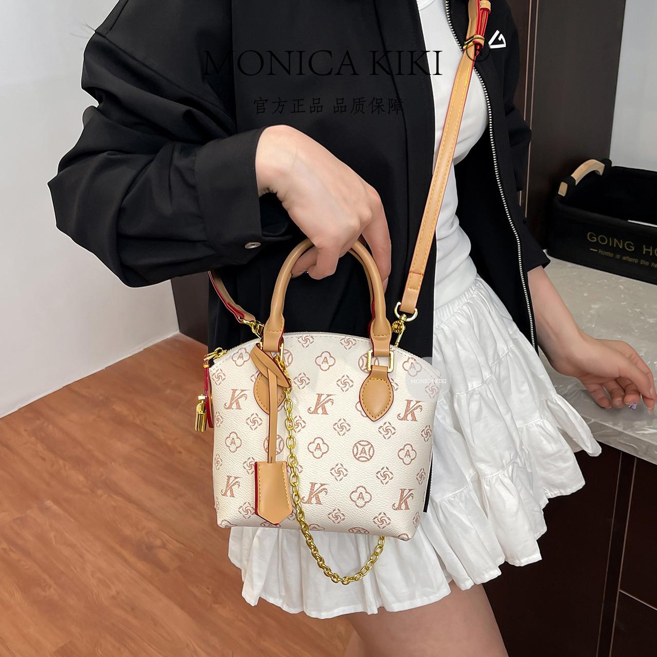 

Monica Qiqi 2025 new classic retro handbag niche versatile oblique span bag fashionable texture shell bag