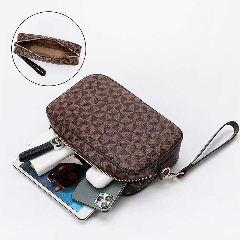 Fashion plaid printing hand grab bag women's new versatile mobile phone change bag hand bag travel toilet bag tide