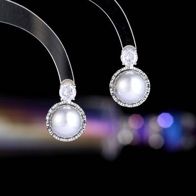 Ladies Light Luxury Design Elegant Round Imitation Pearl Earrings Fashionable and Versatile Unique Design Feeling Earrings