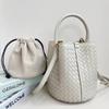 New woven bucket bag leather women's fashion portable messenger bag child and mother bag niche design portable