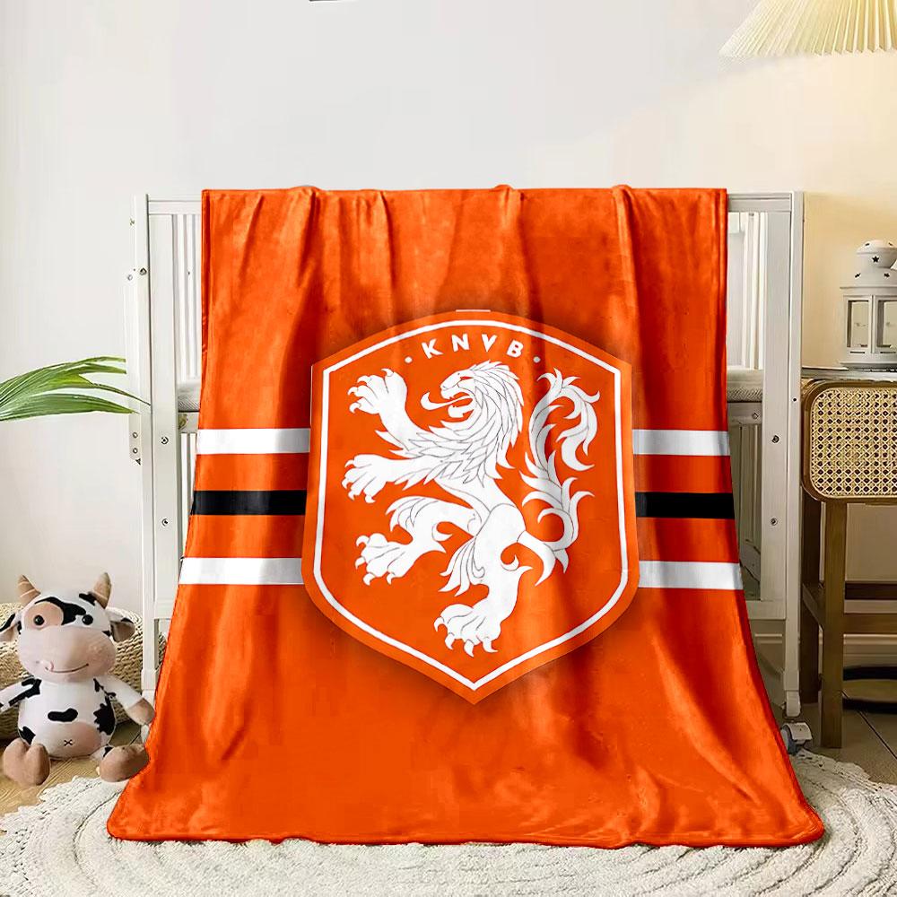 An orange shield with a white lion and KNVB text, framed by stripes. for all seasons blanket lunch break throw gift 80cm x 120cm