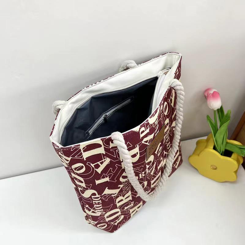 Large Capacity Canvas Tote: Simple, Stylish Commuter Bag for Female Students with Letter Print