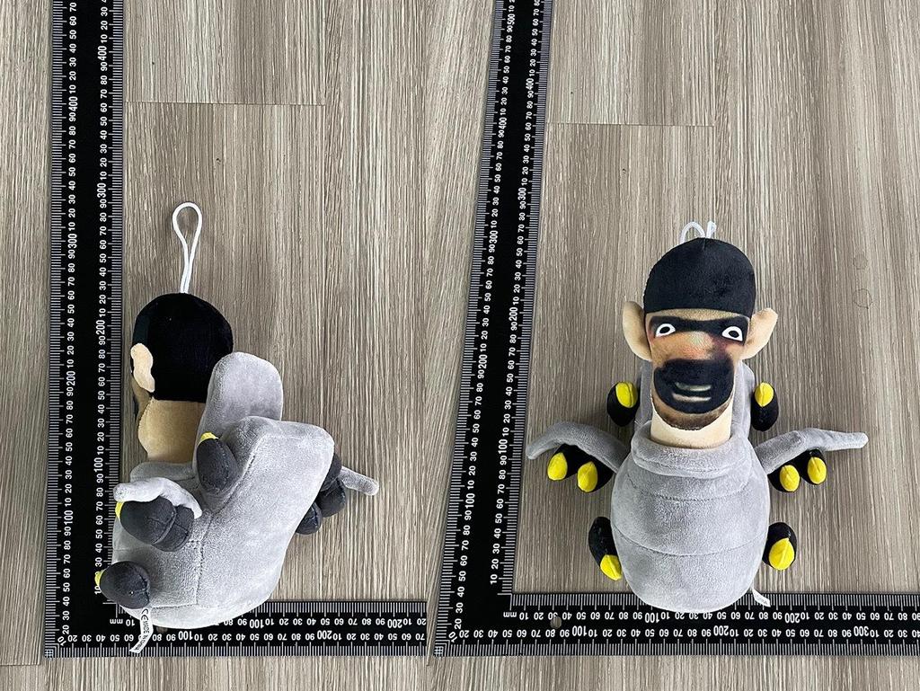 Skibidi Toilet Man Vs. Monitor Man Doll Plush Toy