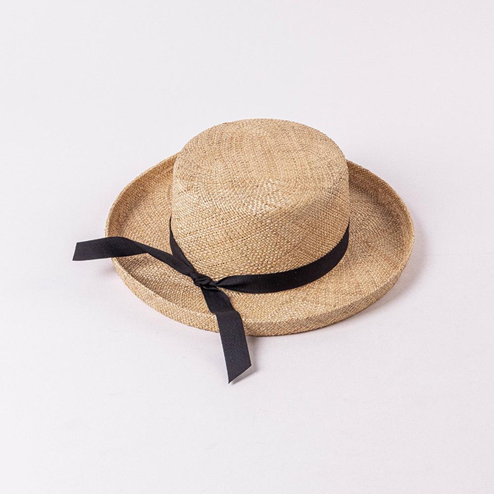 Children's spring and summer fashion casual bow flat top warped edge treasure straw hat outdoor shopping travel sunscreen sunshade straw hat