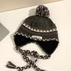 Cozy Chic Knitted Winter Hat For Women Featuring Colorful Pom Poms And Warmth