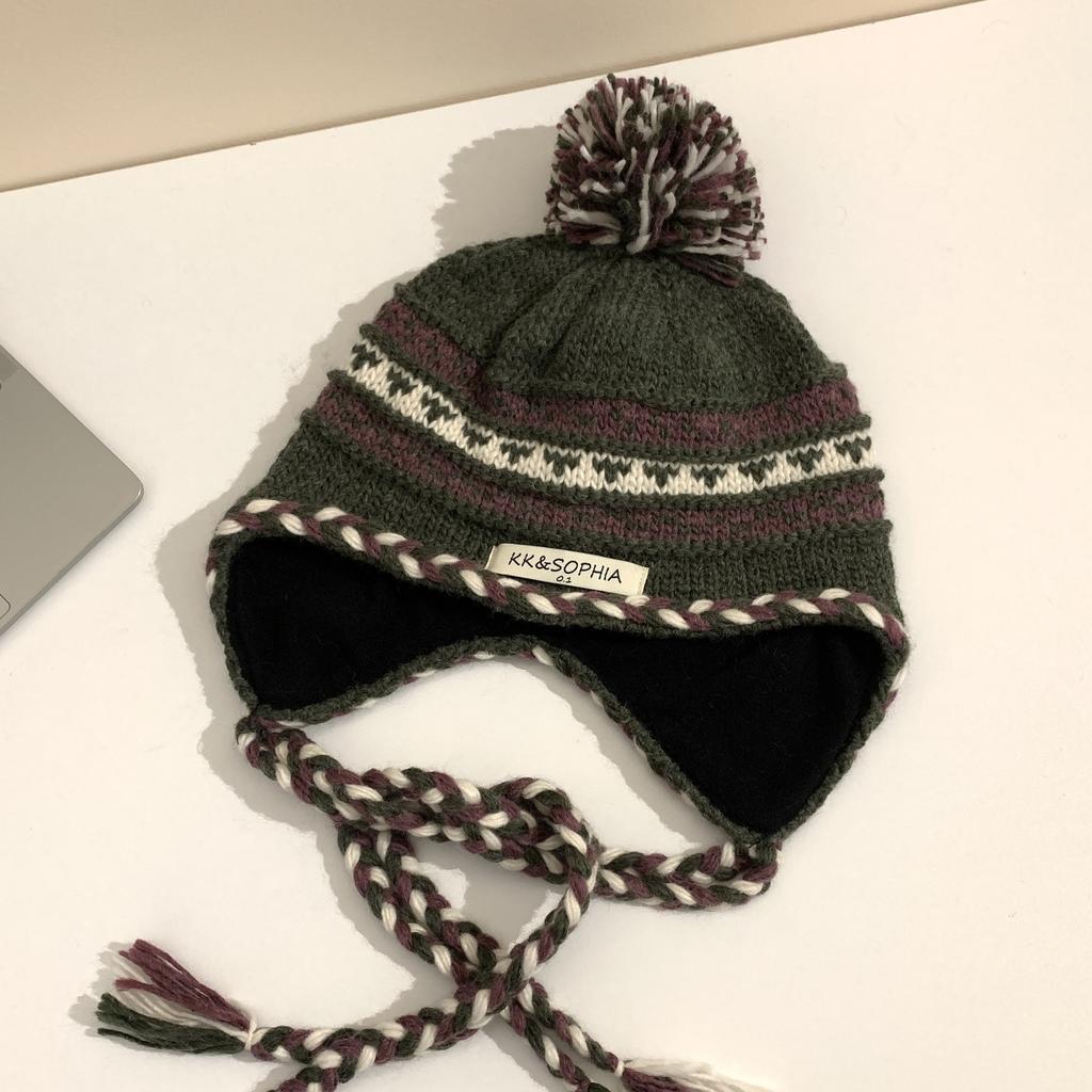 Cozy Chic Knitted Winter Hat For Women Featuring Colorful Pom Poms And Warmth