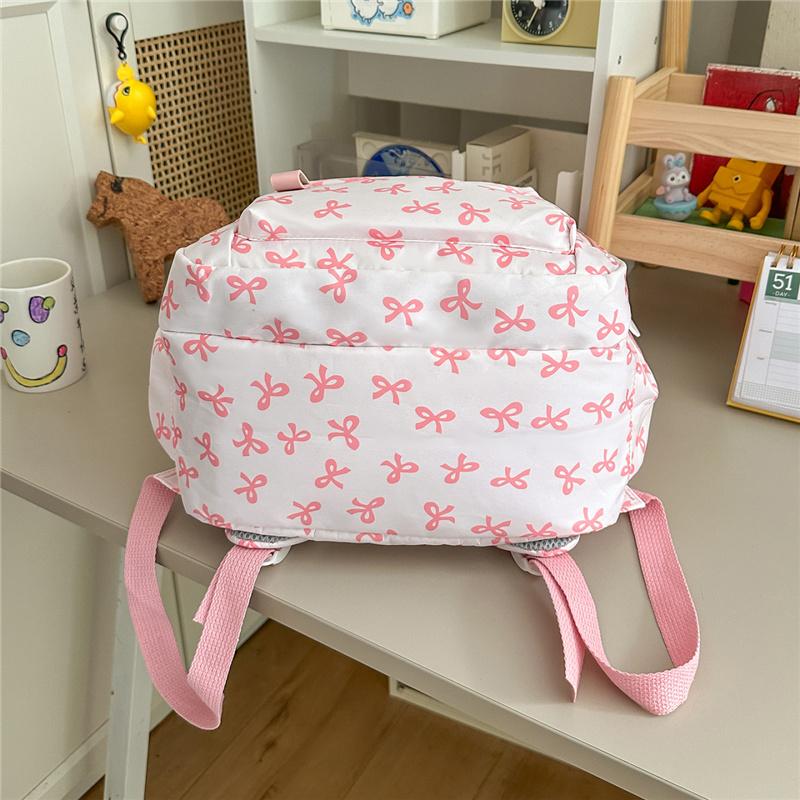 Cute Bow Print Backpack for Women Lightweight Casual Daypack Travel School Bag with Multi Pockets