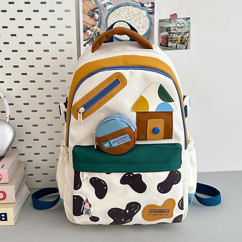 Contrasting color high value versatile backpack light junior high school girl high school student party schoolbag girl cute travel new style