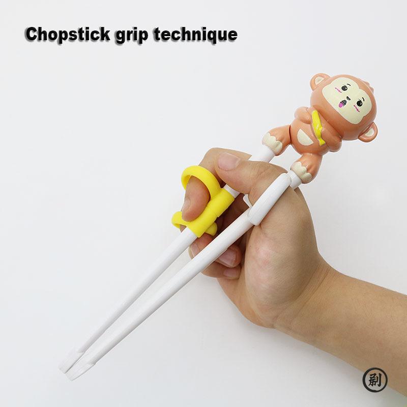 1 pár tréninkových hůlek, dětský pomocník pro učení se hůlkami, hůlky pro začátečníky ve tvaru zvířátek, opakovaně použitelné asistenční hůlky