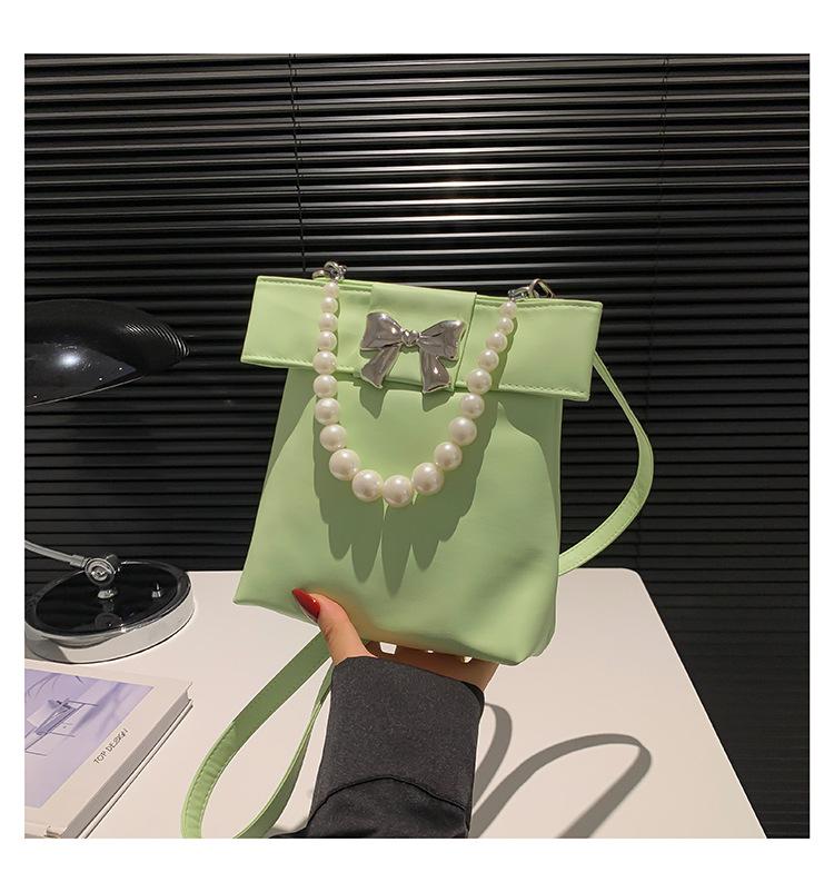

Korean version bag niche design pearl handbag trendy new summer bow small square bag versatile messenger bag зелений