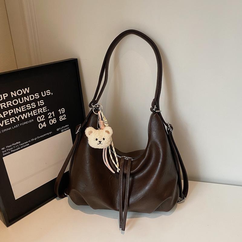 

Large capacity bag women s 2025 new commuter leisure shoulder messenger tote bag multi-functional class backpack