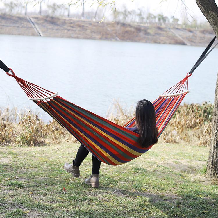 Outdoor Double-Thick Canvas Hammock with Bent Wood Design and Anti-Rollover Feature