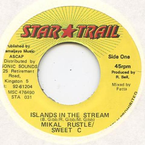 

7-дюймовая пластинка MIKAL RUSTLE, SWEET C - Island In The Stream Star Trail 1994 Ямайка Регги, Ска и Даб