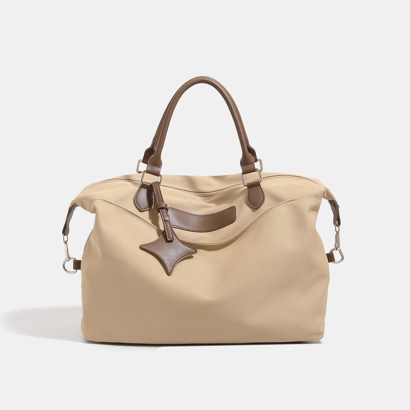 

2025 new men s and women s fashion high-end handbag versatile commuter cloth bag shoulder bag messenger bag portable хакі