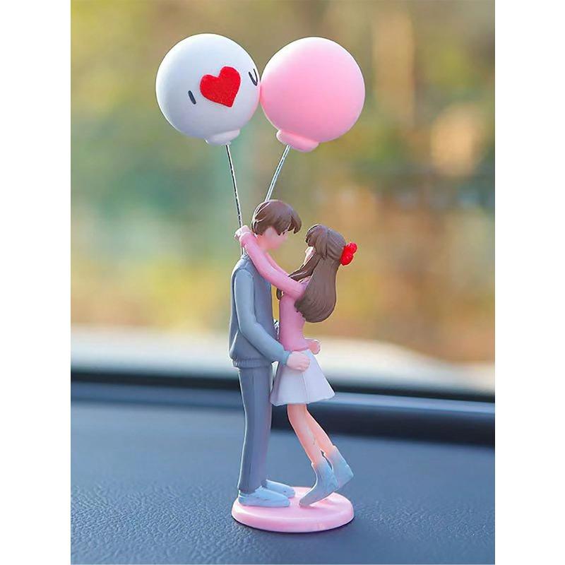 

Украшение центральной консоли приборной панели автомобиля - Обнимающаяся пара, держащая воздушный шар, фигурка one-size разноцветный