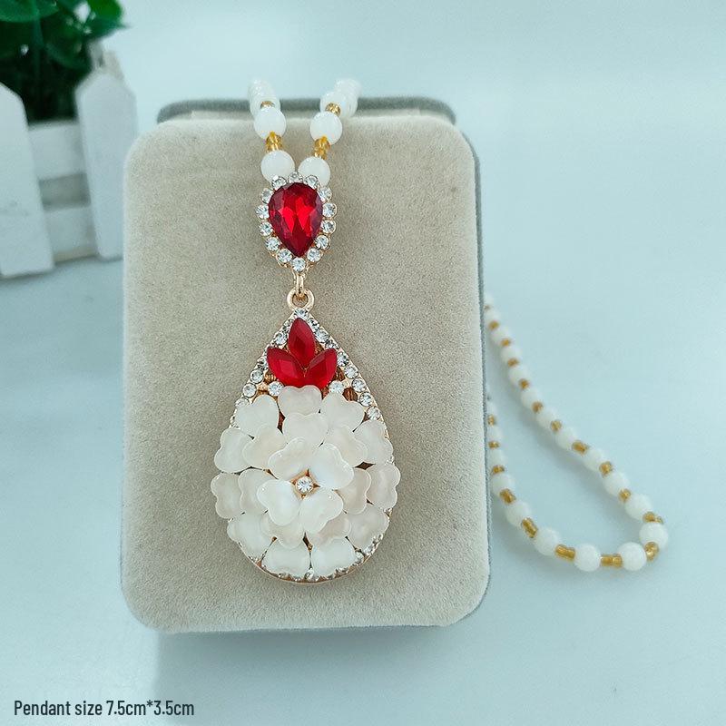 Damen Lange Blumen-Anhänger-Halskette - Elegante Wassertropfen-Pulloverkette für Herbst/Winter