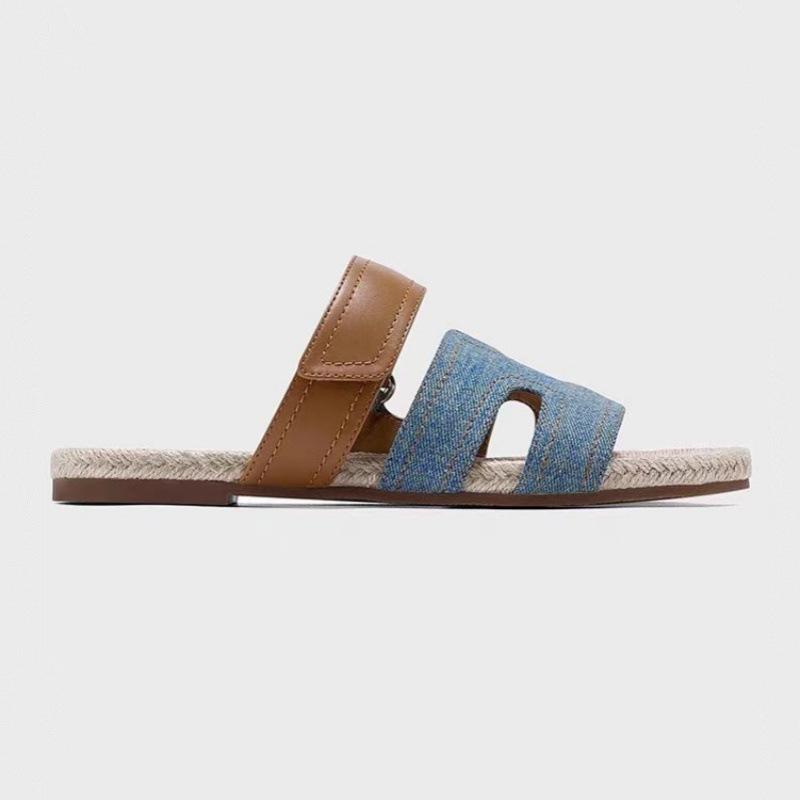 

Slippers women s 2025 new outer wear summer niche French fashion grass woven wind flat bottom beach sandals 40 синій