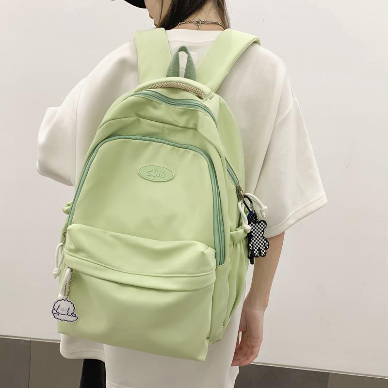School bag female Japanese junior high school student backpack Korean version solid color soft girl girl backpack simple college backpack