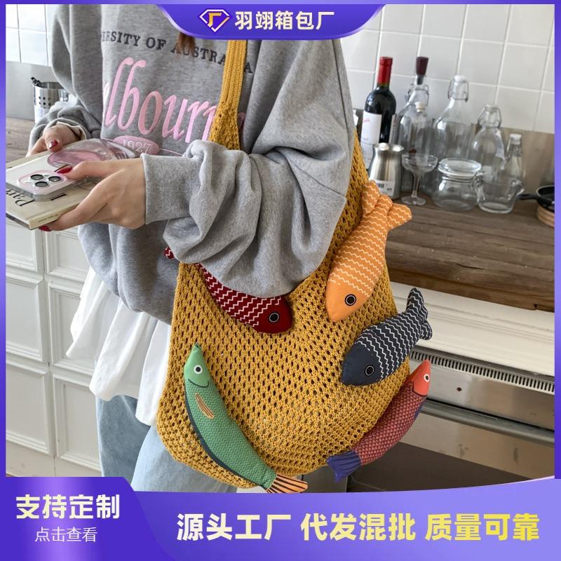 Niche bag women's large-capacity new summer leisure shoulder knitted woven bag commuter tote bag