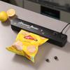 Vakuumverpackungsmaschine, Haushalts-Lebensmittel-Automatische Vakuumversiegelungsmaschine, Kleine Kunststoffversiegelungsmaschine, Mechanische Versiegelungs- und Konservierungsmaschine