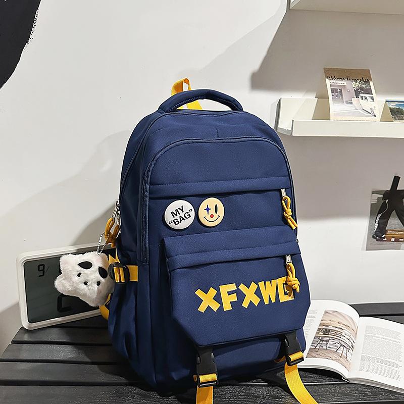 Korean ins style high appearance Harajuku trendy couple backpack junior high and high school students light and large capacity schoolbag girl
