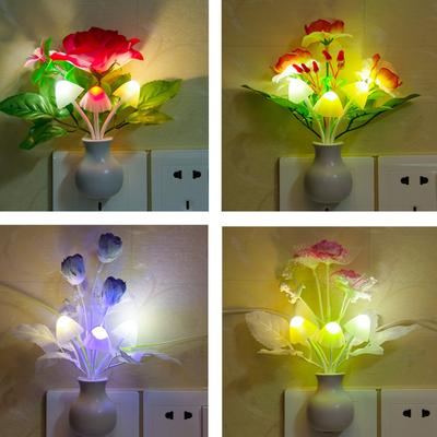 Ein brandneues LED-intelligentes Nachtlicht nach europäischem Standard, mit einer siebenfarbigen Vase, einer Lilie und einem dreifarbigen Pilz
