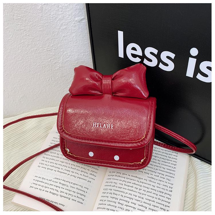 

Набор детской сумки кроссбоди с бантом в горошек и кошелька для монет красный