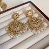 European and American metal wind hollow flower fishtail pearl earrings exaggerated temperament earrings heavy industry earrings
