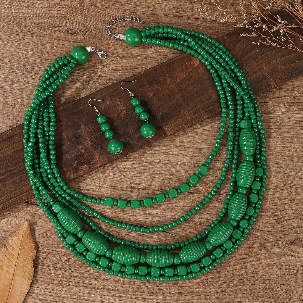 Set di Collana e Orecchini in Perline di Legno Geometriche Bohemien per Feste
