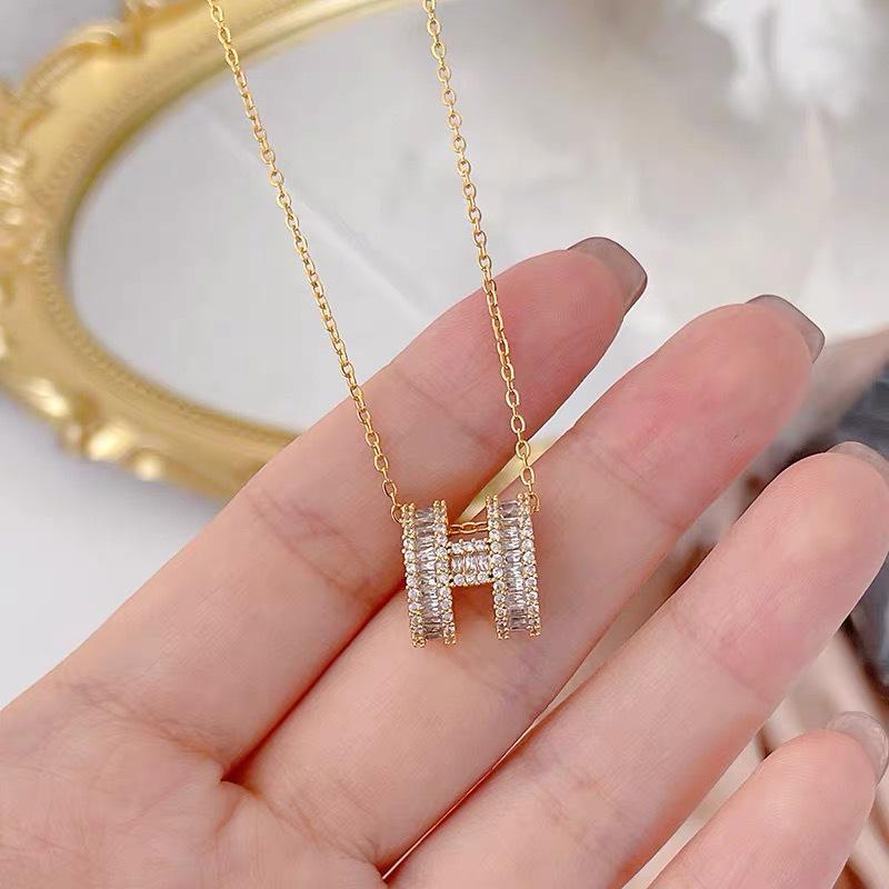 

Подвеска из позолоченной меди с бриллиантом, ожерелье H - Элегантный минималистичный женский аксессуар