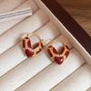 Red Bow Coin Purse Earrings: Silver Needle Retro Snake Lock Studs, New Year High-End Ear Jewelry.