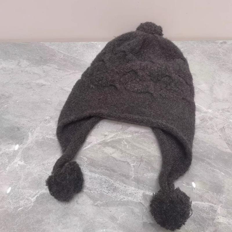 Męskie i damskie jesienno-zimowe nowe modne czapki urocze ciepłe dziergane czapki na uszy wełniane z domieszką wełny odmładzające żakardowe czapki wełniane