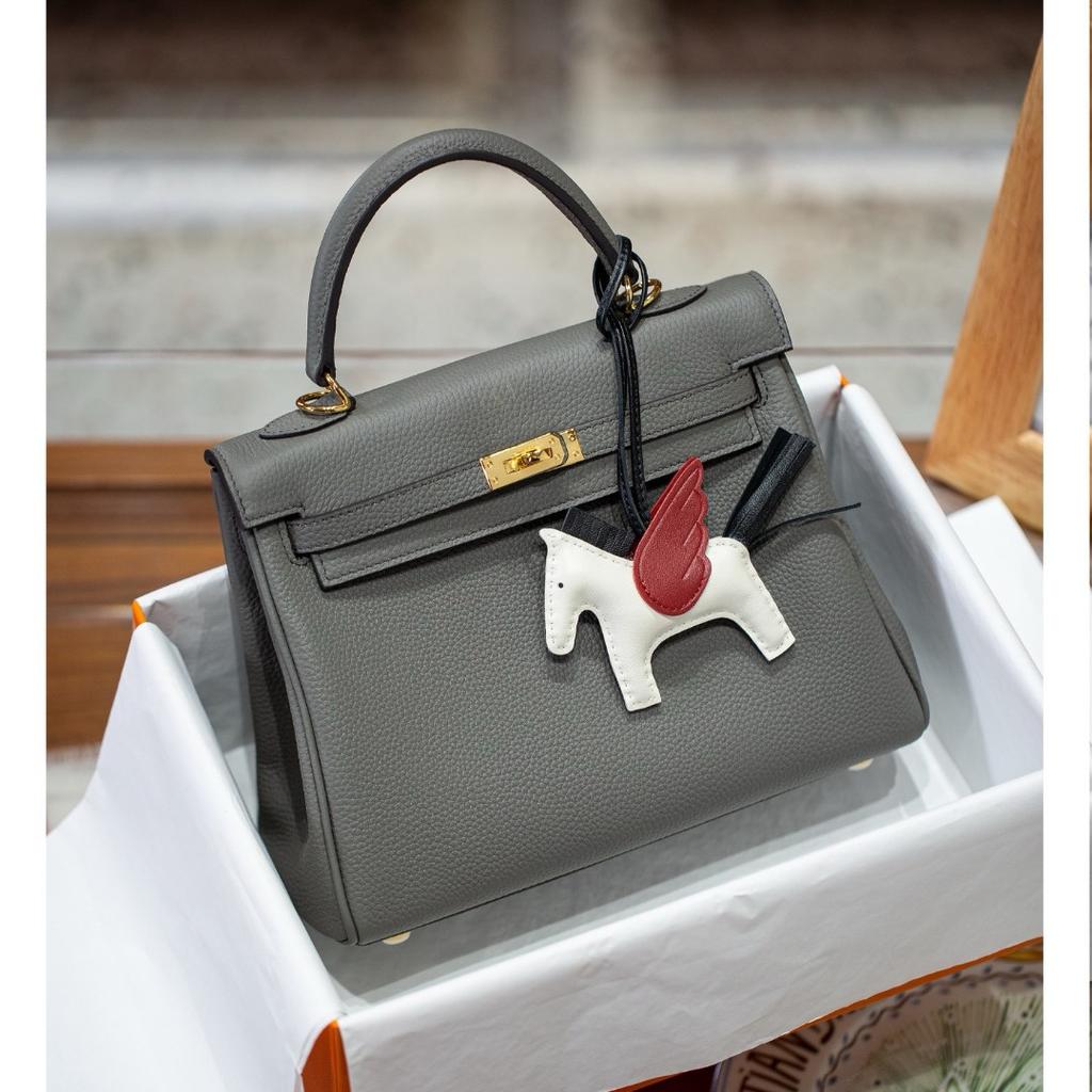 25 Neue Kelli Tasche Togo Rindsleder erste Schicht breiter Schultergurt silberne Schnalle große Kapazität tragbar Schulter Umhänge Tasche Pendler Damen Tasche