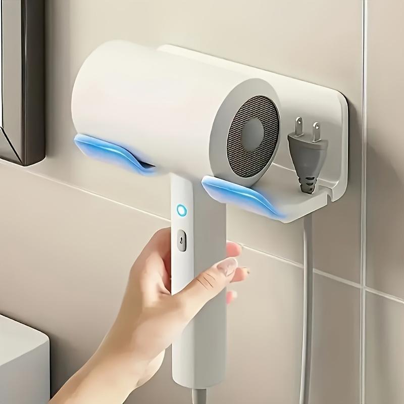 1-Piece Wall-Mounted Hair Dryer Organizer - Sleek White Plastic Corner Holder for Bathrooms and Homes.