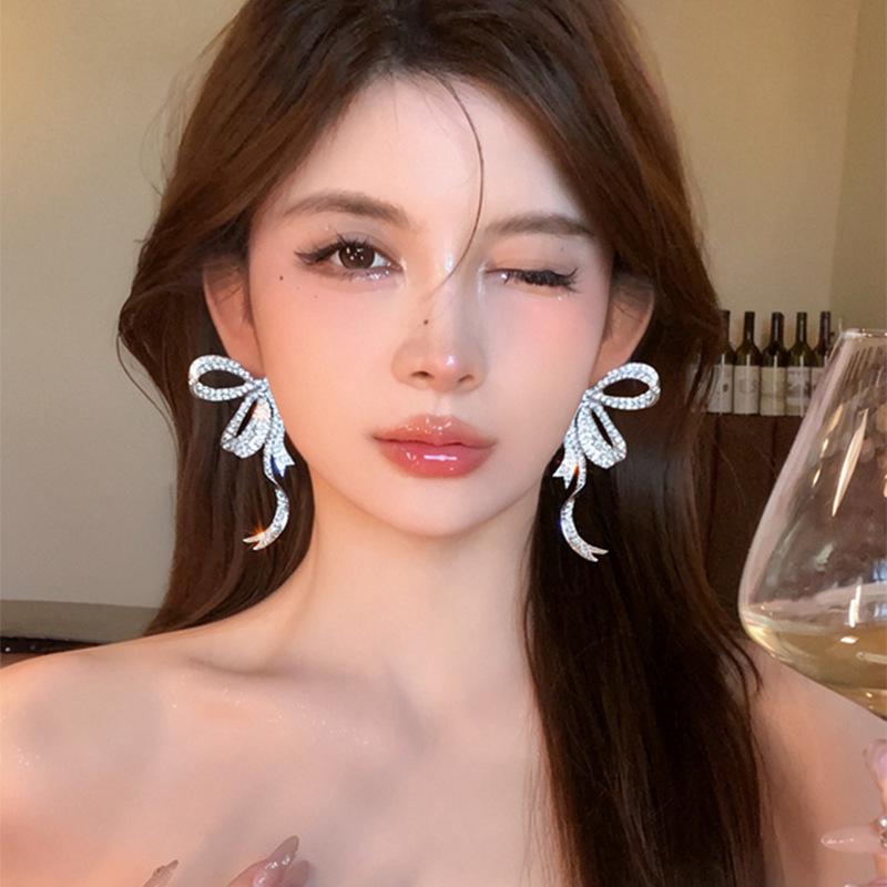 Exquisite Rhinestone Bow Tassel Earrings: Silver Needle French Court Style Luxury Ear Studs for Women.