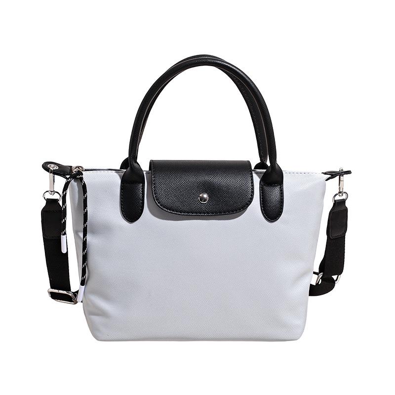 Minimalist Color-Block Oxford Cloth Handbag: Versatile, Fashionable Shoulder Bag with Unique Texture.