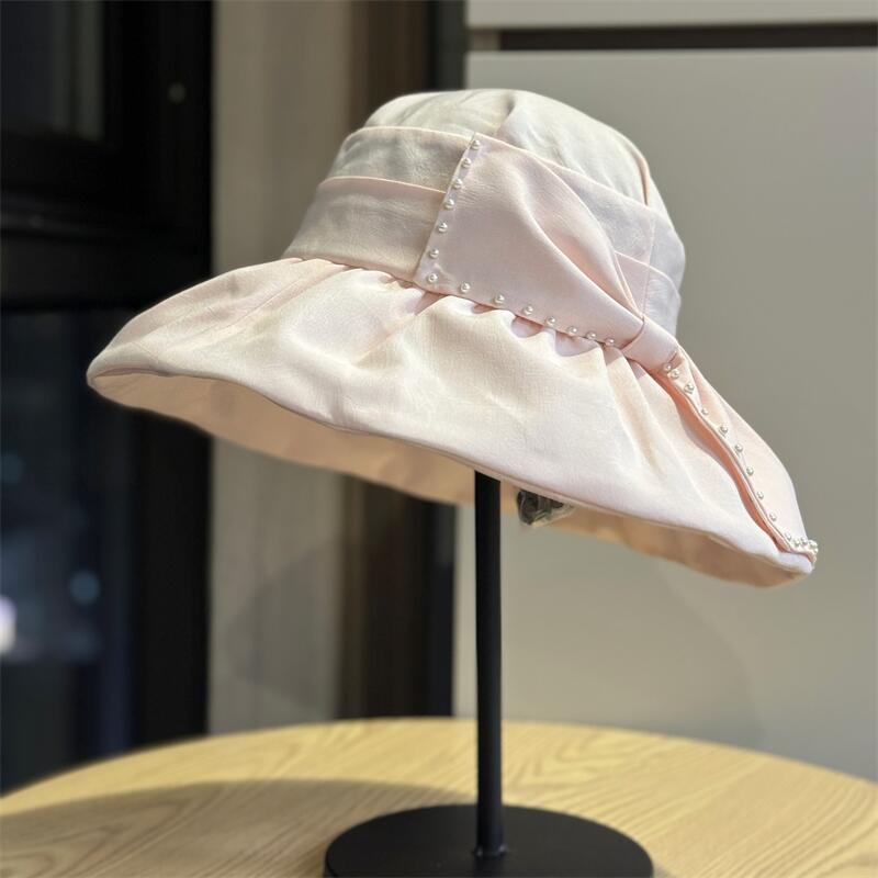 

Korean-style bowknot wide-brimmed sun hat for women, summer sun hat that makes the face look smaller, suitable for vacations, outdoor sun protection, Adult54-60Adjustable рожевий