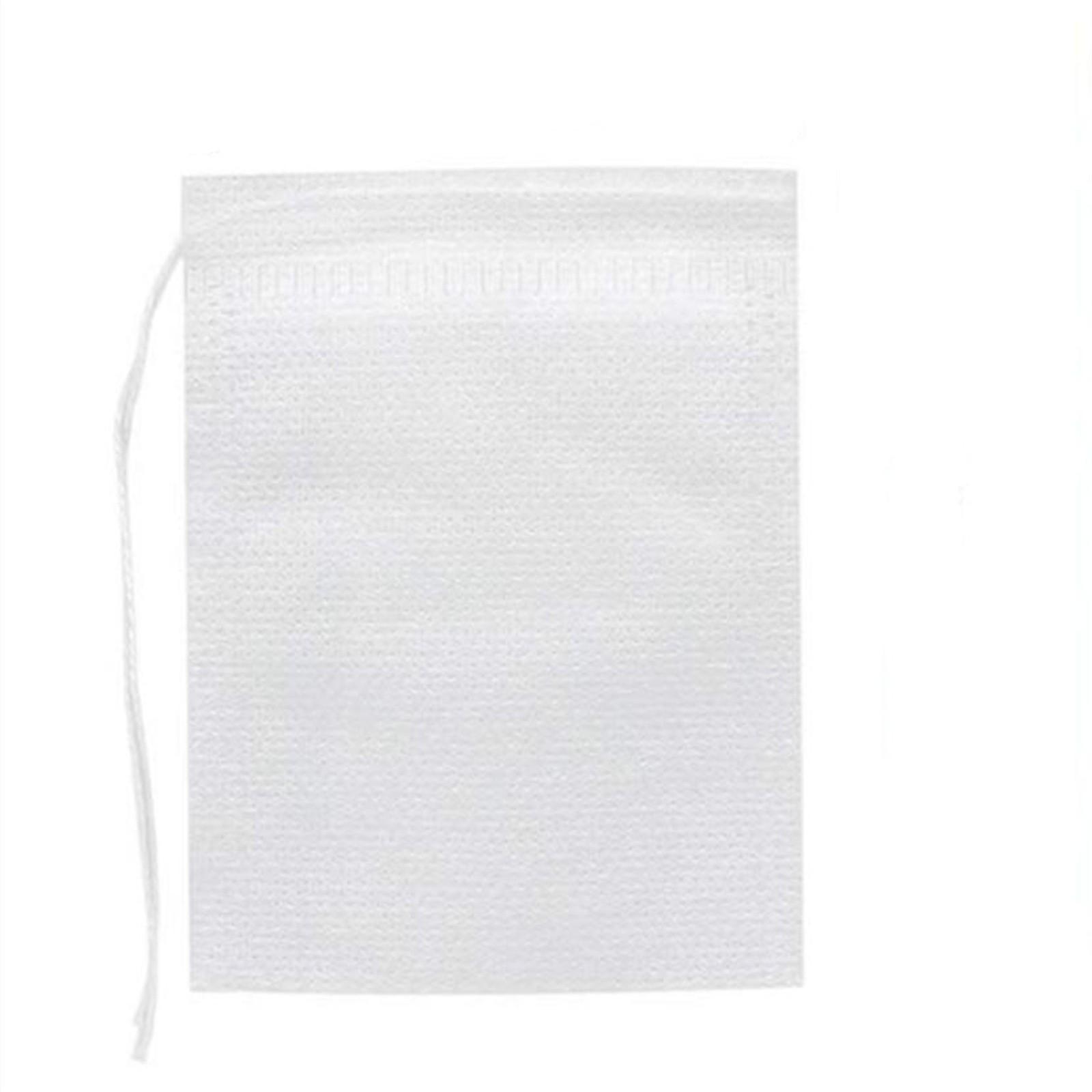 Одноразовые чайные ситечки в пакетиках. Пустые хлопковые чайные пакетики с герметичным ситечком на шнурке. белый