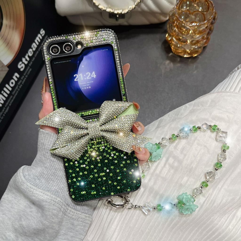 Applicable to Samsung ZFlip6 rhinestone bow flash diamond case zflip7 folding screen all-inclusive luxury bracelet protective case