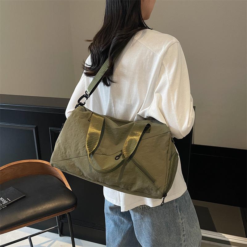 Travel bag women's new large-capacity travel bag niche design casual fitness bag personalized trendy shoulder yoga bag