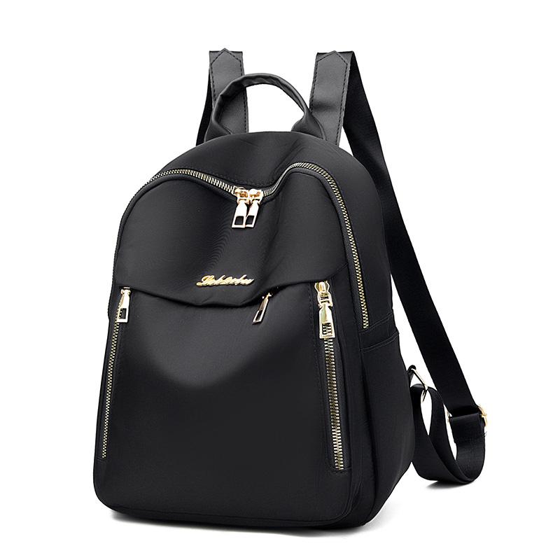 1 women's travel backpack, large capacity Oxford cloth nylon backpack, with adjustable shoulder straps, black color, zipper clos
