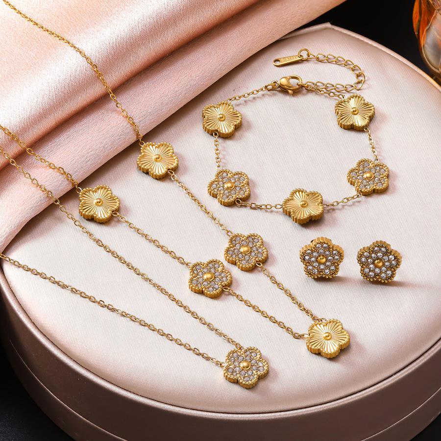 Elegant Five-Petal Rhinestone Flower Jewelry Set: 18K Gold-Plated Bracelet, Necklace & Earrings