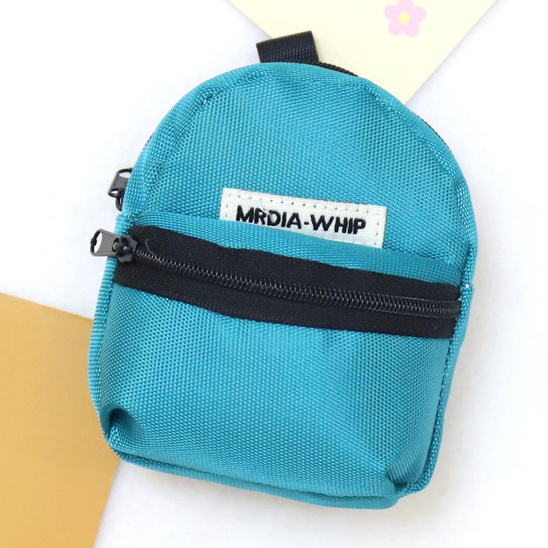 

Xiaohongshu Earphone Coin Purse: Cute Mini Backpack Mushroom House Accessory with Zipper and Phone Lanyard