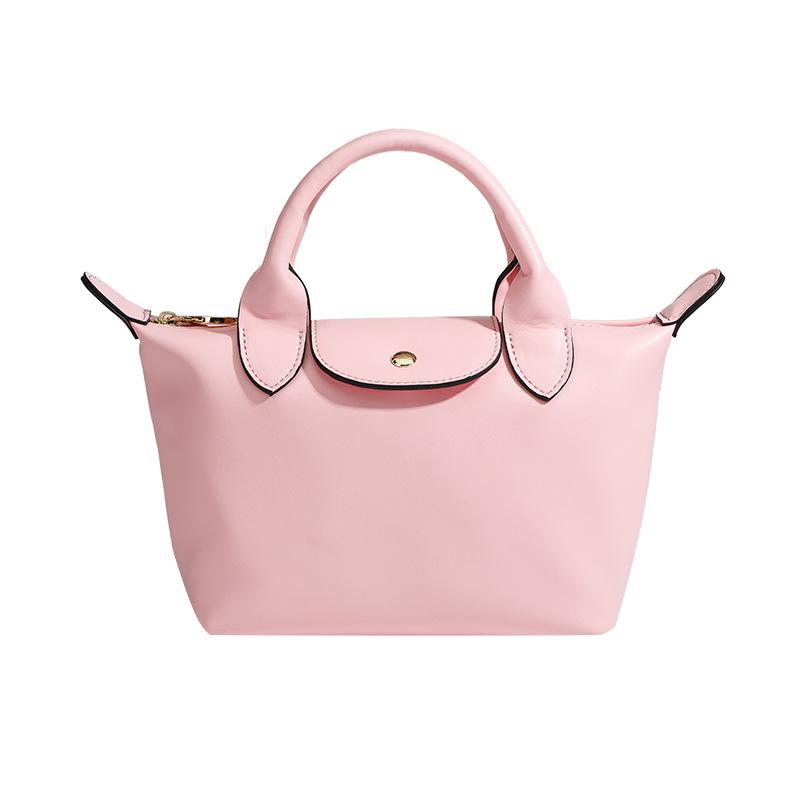 

Large capacity portable niche premium shoulder bag casual versatile hand bag розовый