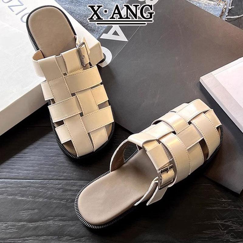 

Cowhide version soft-soled bag head half slippers women s summer wear 2025 new woven hollow pig cage shoes Roman sandals women 40