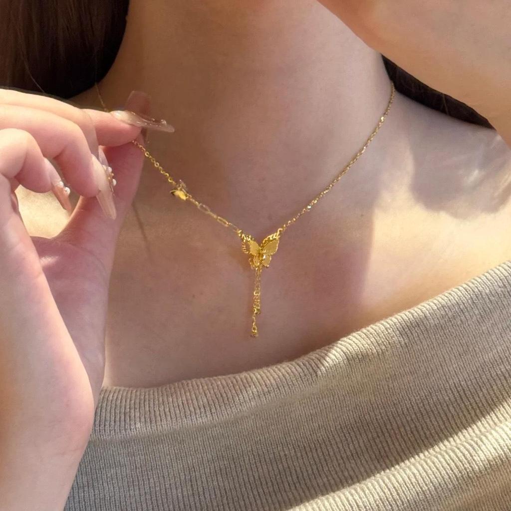Elegante Quasten-Halskette mit Schmetterling: Glänzendes Luxusdesign für Frauen