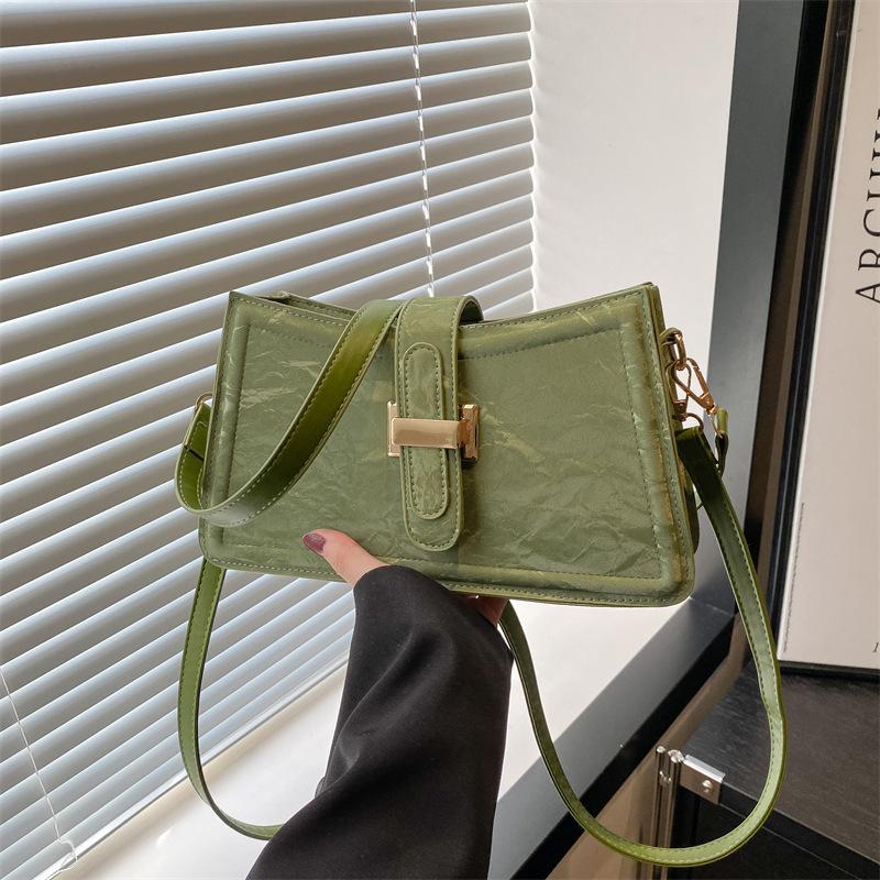 

Premium texture temperament casual versatile commuter women s bag foreign style 2025 French new shoulder messenger bag niche bag зелёный