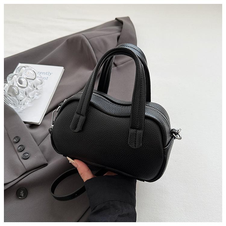 

Fashion pebbled pattern hand-held Boston bag women s 2025 new niche design crossbody bag foreign style commuter shoulder bag чёрный