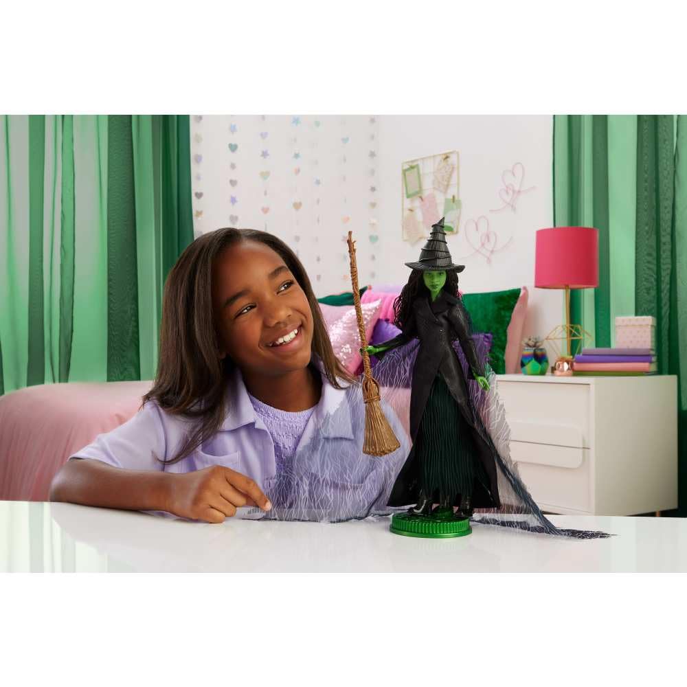 Mattel Universal Pictures A lovely deluxe Elphaba fashion doll inspired by the with removable outfit and 4 Wick movie, accessories.