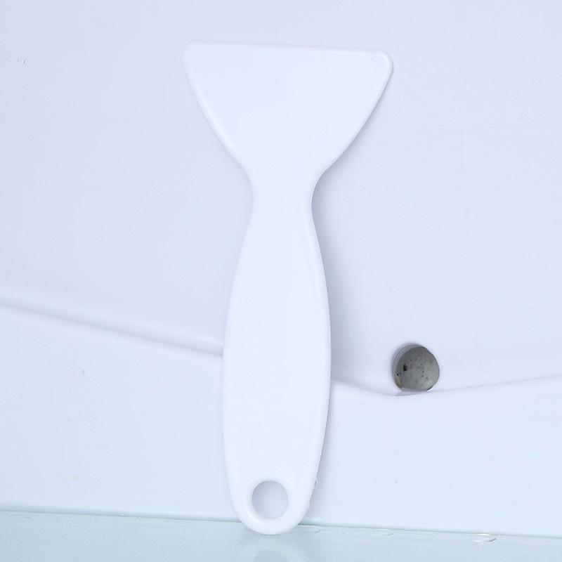 

Plastic Ice Scraper & Defroster Tool for Kitchen Freezers As shown